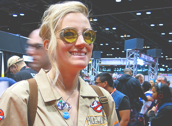 ghostbuster cosplayer wearing buttons