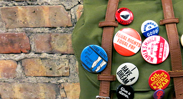 protest buttons on backpack