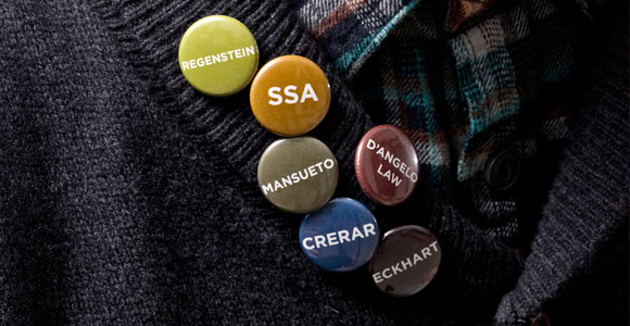 Chicago Library buttons being worn on a sweater