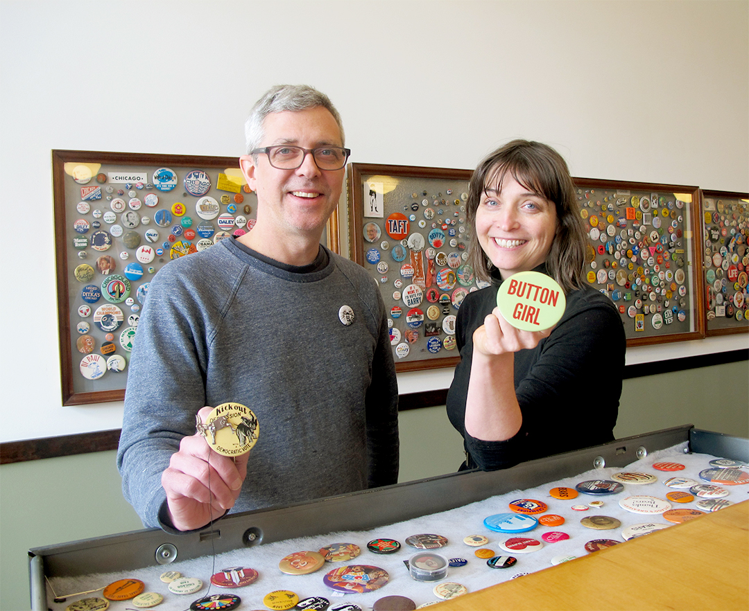 Christen and Joel Carter, curators of the Button Museum holding their favorite button
