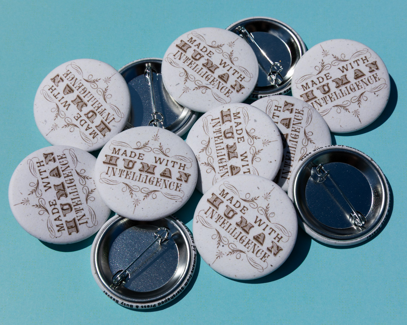 Made with Human Intelligence Custom Matte Buttons Designed by Jen Farrell of Starshaped Press Made with Human Intelligence Custom Matte Buttons Designed by Jen Farrell of Starshaped Press