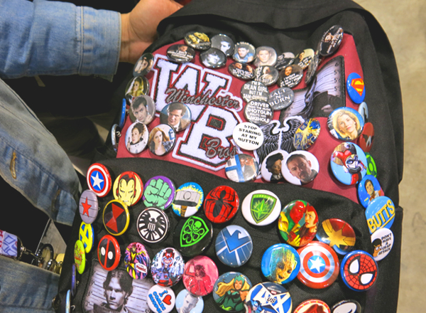 comic con buttons on backpack