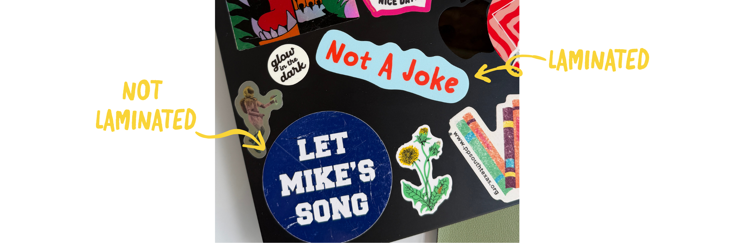 laptop featuring multiple custom sticker designs some are faded and some are bright to show the difference between laminated and unlaminated stickers