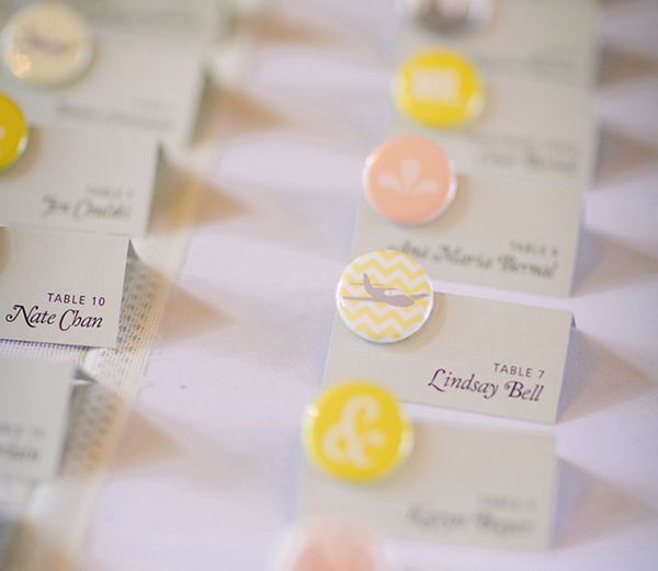 wedding escort card featuring button